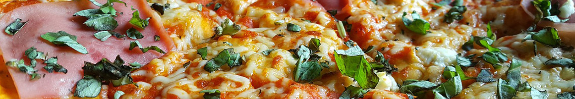 Eating Pizza at Valentino Pizzeria Trattoria restaurant in Sarasota, FL.